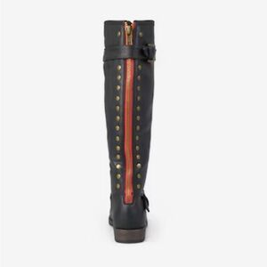 Tall black riding boots